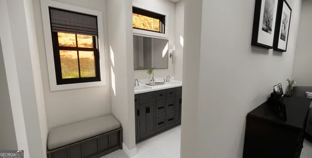 a bathroom with a sink a toilet and mirror