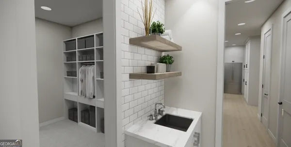 a room with cabinets and a fireplace
