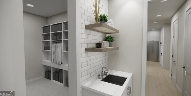 a room with cabinets and a fireplace