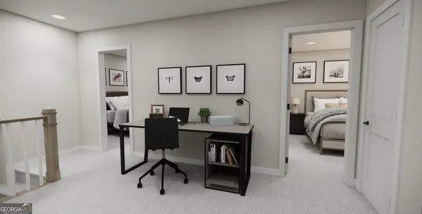 a view of a workspace with furniture