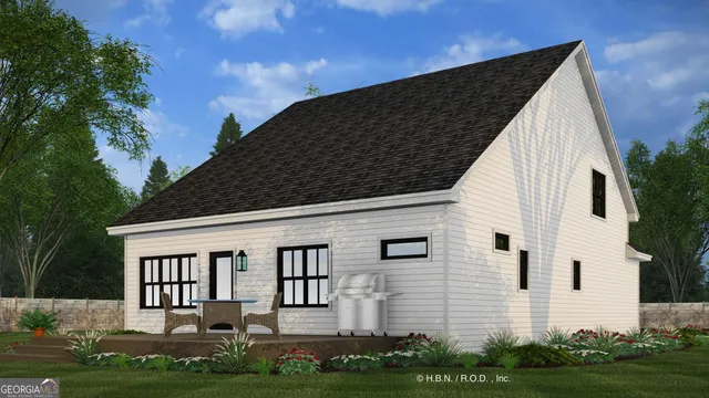 a view of a house with backyard