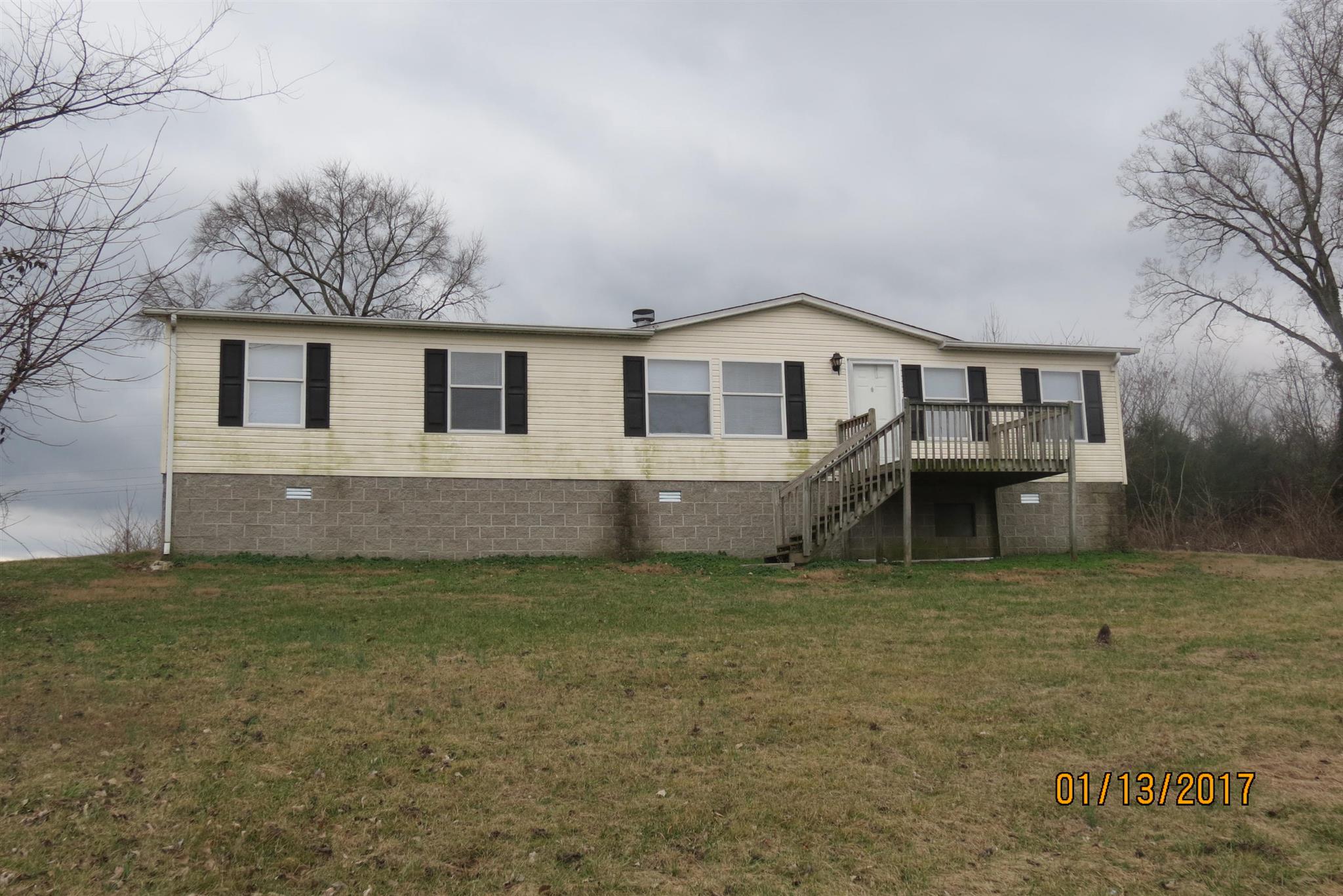 898 Bell Road Watertown, TN 37184 - Photo 1 of 23 a house that has a lot of windows in it