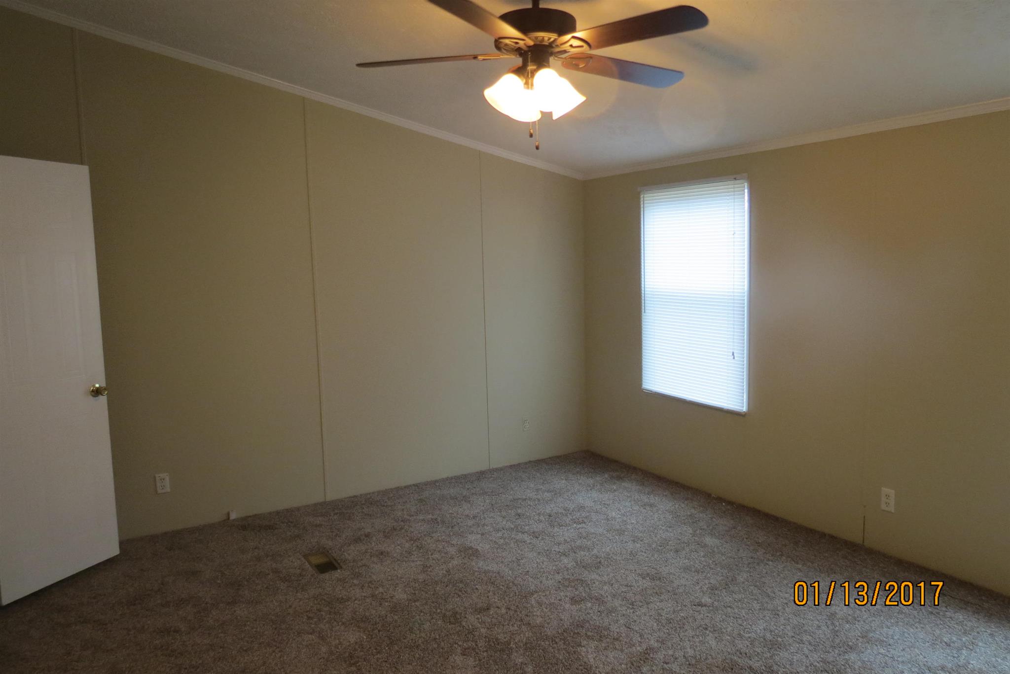 898 Bell Road Watertown, TN 37184 - Photo 12 of 23 an empty room with a window