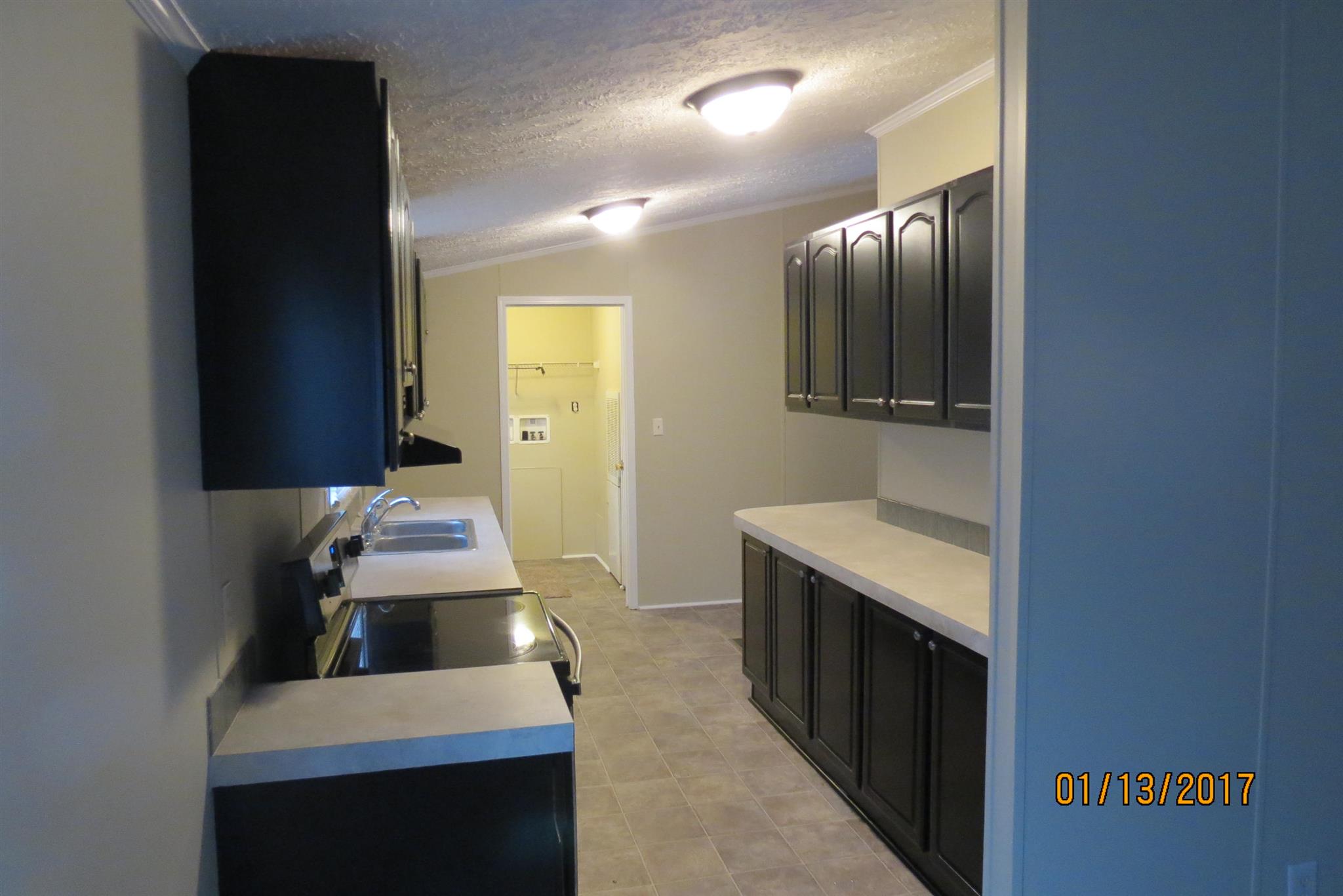 898 Bell Road Watertown, TN 37184 - Photo 6 of 23 a bathroom with a sink and a mirror