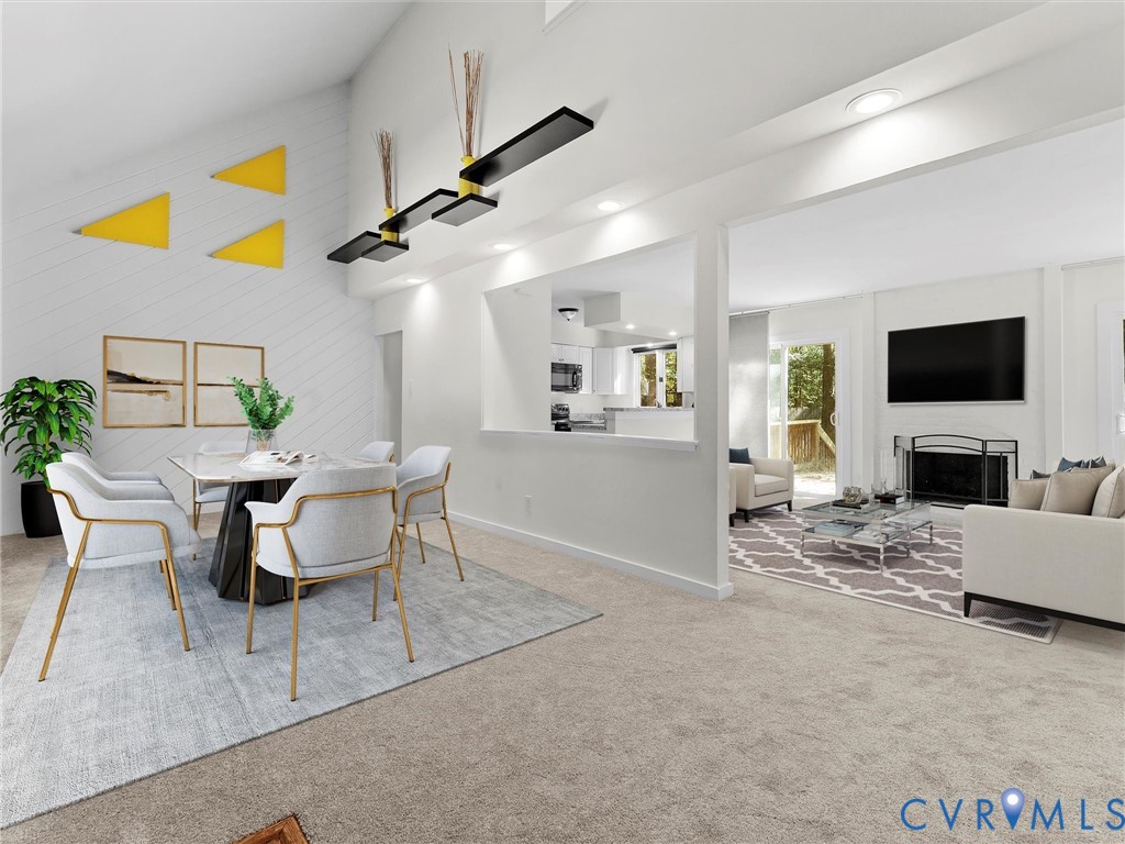 3601 Quail Meadows Place Midlothian, VA 23112 - Photo 4 of 27 Dining space with a fireplace, a towering ceiling,