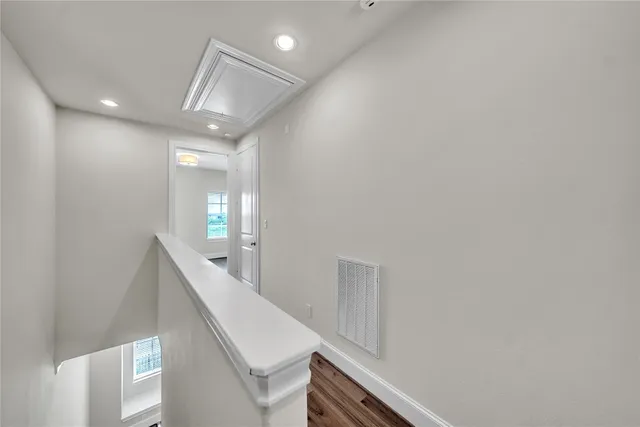 a hallway with windows