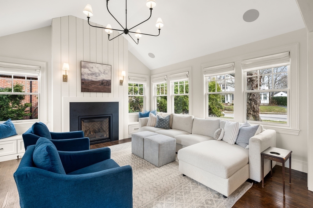 3 Cleveland Road Brookline, MA 02445 - Photo 23 of 27 a living room with furniture and a fireplace