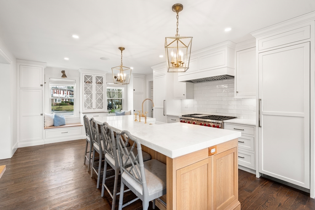 3 Cleveland Road Brookline, MA 02445 - Photo 24 of 27 a kitchen that has a table and chairs in it