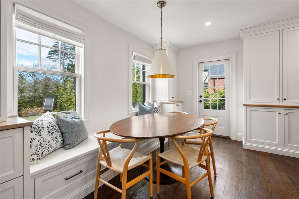 3 Cleveland Road Brookline, MA 02445 - Photo 25 of 27 a view of a dining room with furniture window and wooden floor