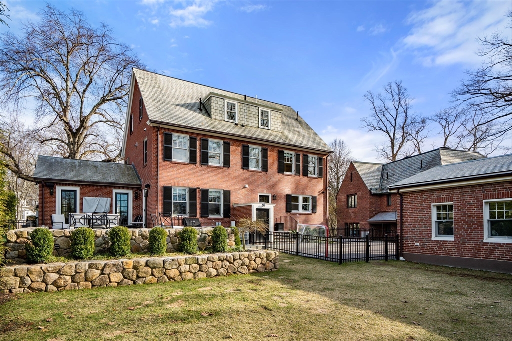 3 Cleveland Road Brookline, MA 02445 - Photo 6 of 27 a front view of a building with a yard
