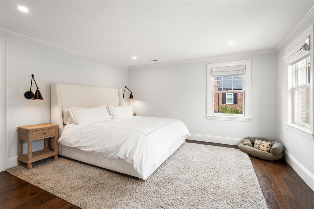 3 Cleveland Road Brookline, MA 02445 - Photo 9 of 27 a bedroom with a bed and a couch