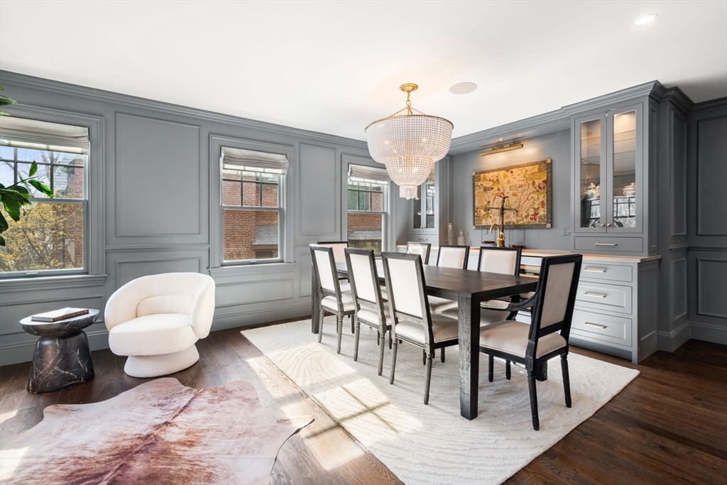 3 Cleveland Road Brookline, MA 02445 - Photo 10 of 27 a view of a dining room with furniture and wooden floor