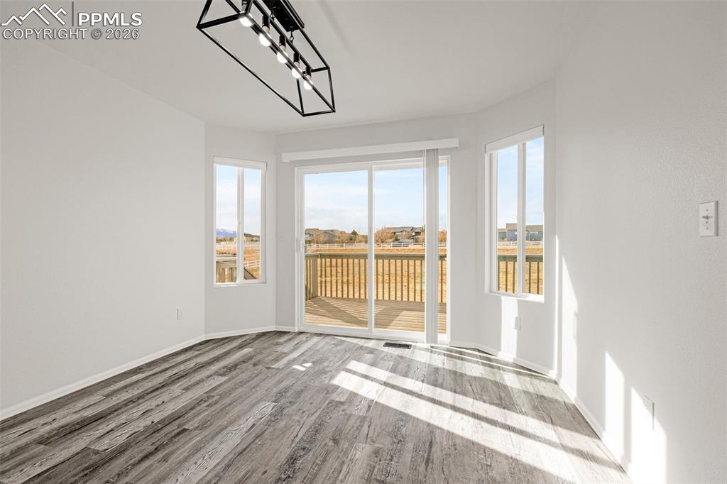 8388 Fort Smith Road Peyton, CO 80831 - Photo 17 of 49 a view of an empty room with a window