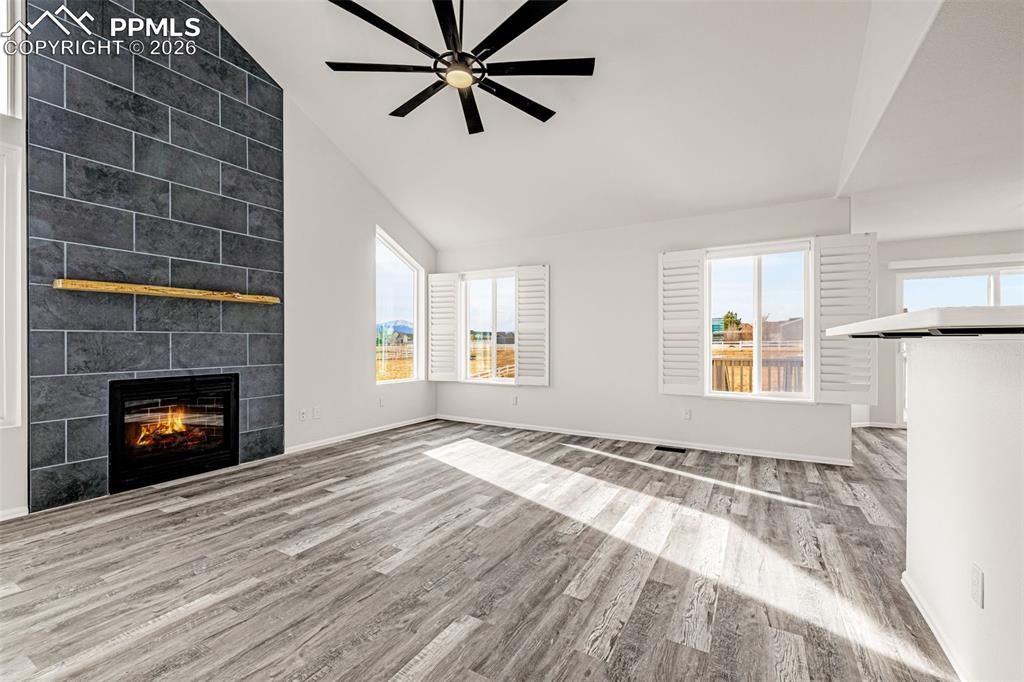8388 Fort Smith Road Peyton, CO 80831 - Photo 20 of 49 a view of a livingroom with a fireplace and window