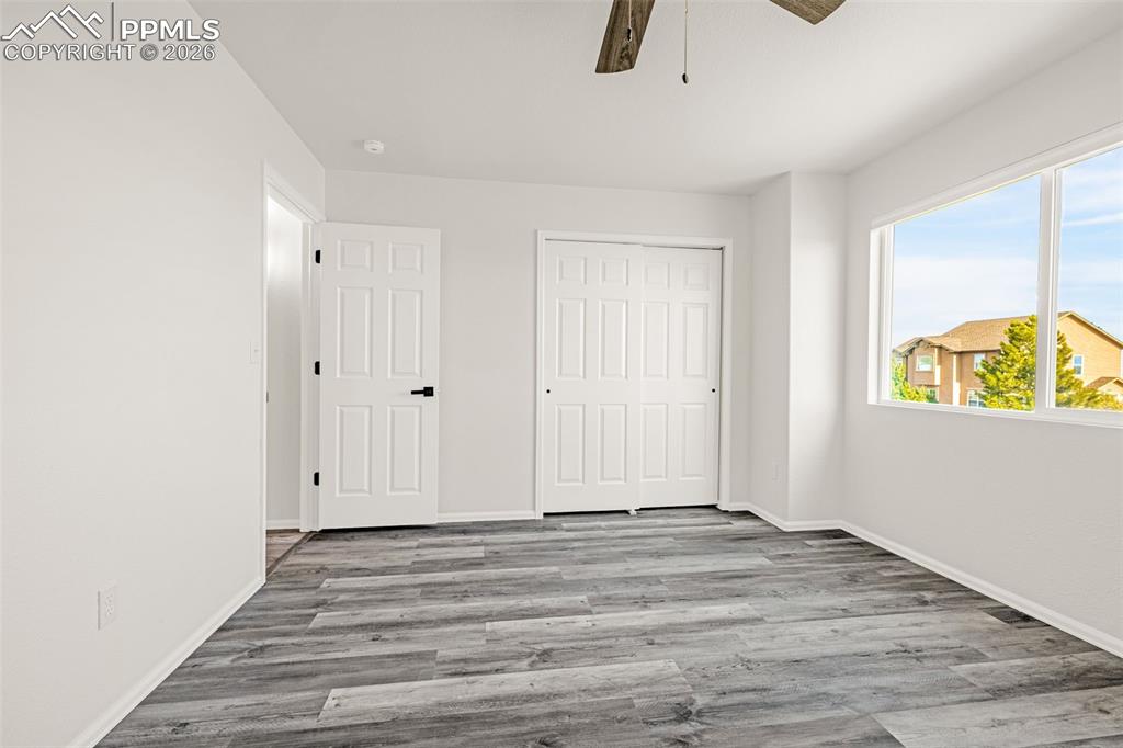 8388 Fort Smith Road Peyton, CO 80831 - Photo 31 of 49 a view of an empty room with window and closet