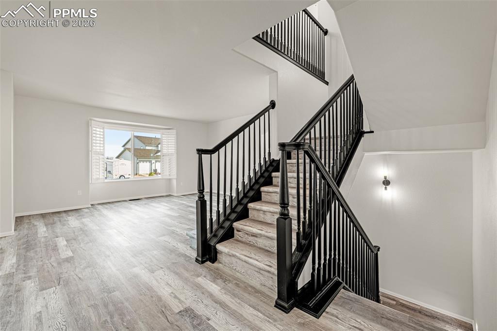 8388 Fort Smith Road Peyton, CO 80831 - Photo 35 of 49 a view of an entryway with wooden floor