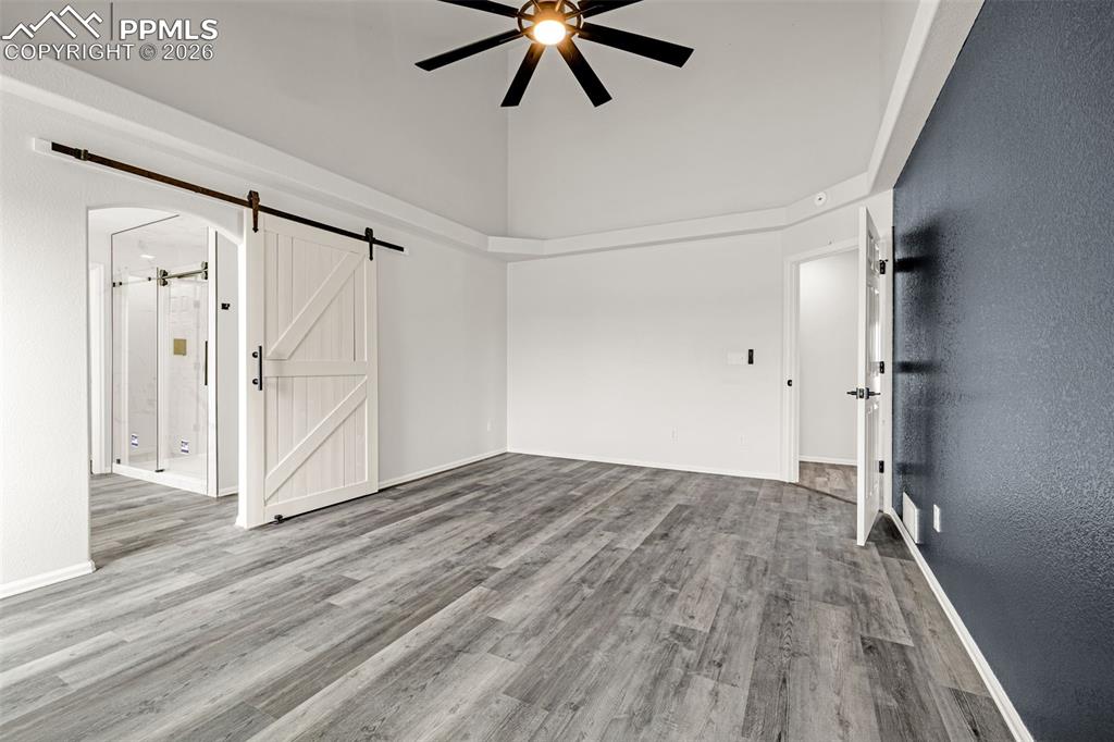 8388 Fort Smith Road Peyton, CO 80831 - Photo 7 of 49 a view of empty room with wooden floor