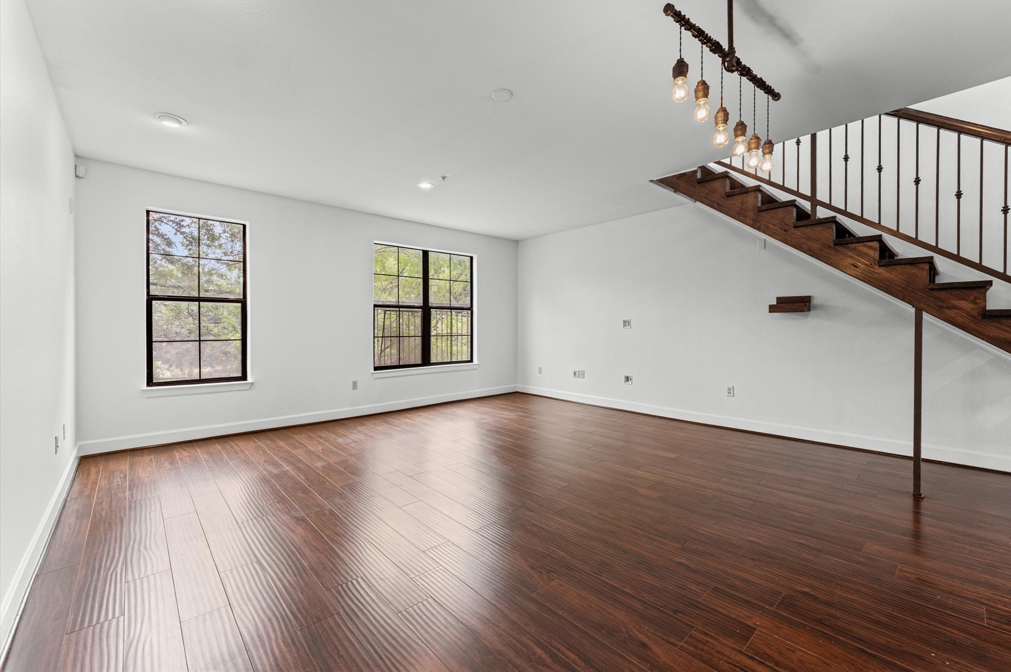 1602 Elgin Street, Unit 10 Houston, TX 77004 - Photo 5 of 21 The kitchen and living areas connect seamlessly, creating a comfortable, open feel throughout the unit's first floor.