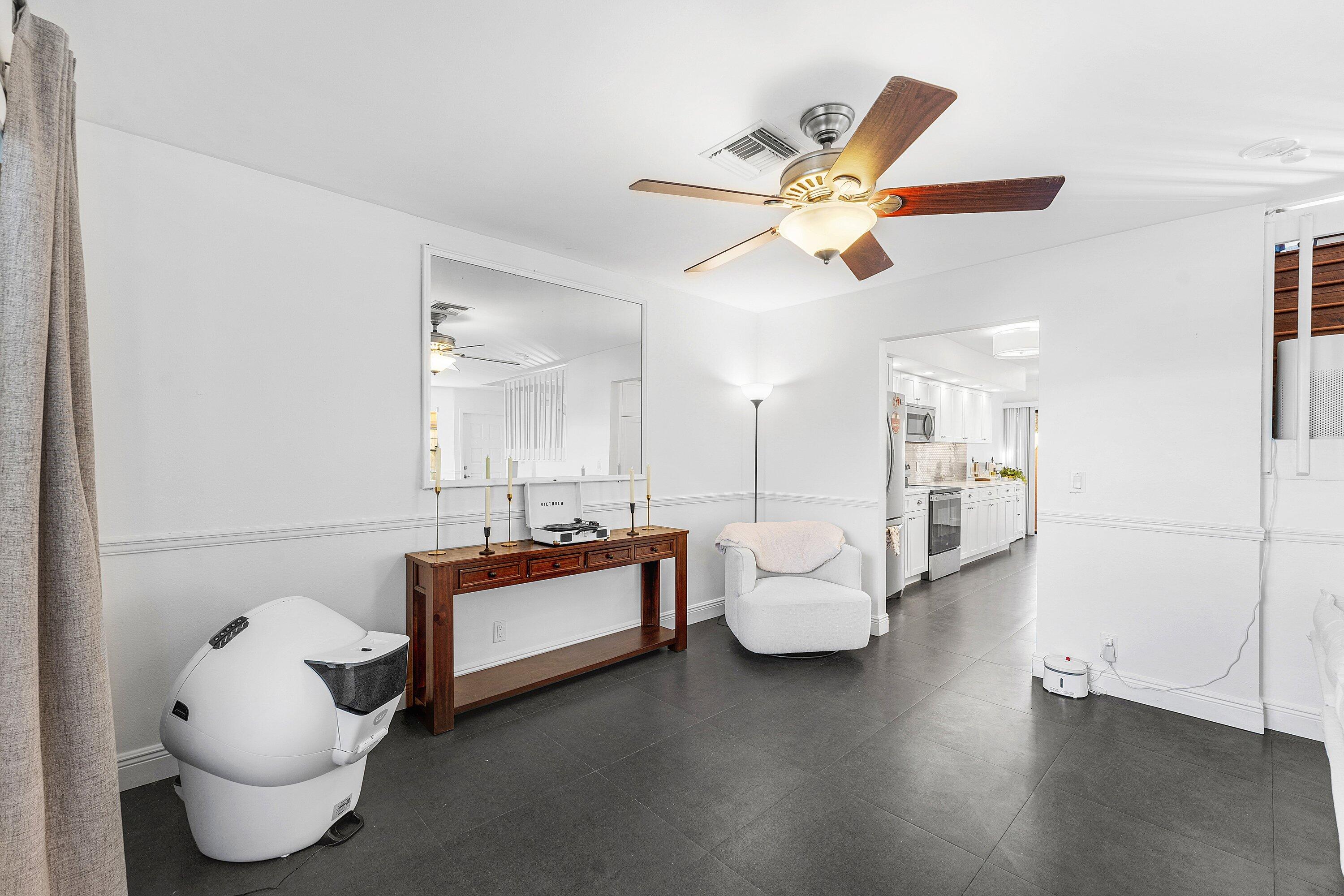 19931 Villa Lante Place Boca Raton, FL 33434 - Photo 8 of 49 a living room with furniture and a large window