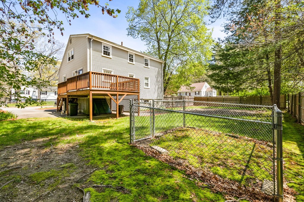 119 Spallus Road Stoughton, MA 02072 - Photo 29 of 38 a view of a house with a large trees