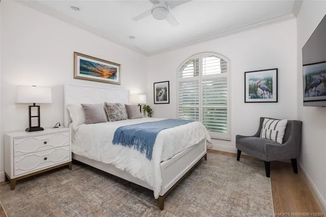 a spacious bedroom with a bed and a couch