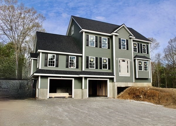 26 Arcadia Road Billerica, MA 01821 - Photo 2 of 4 a front view of a house with a yard