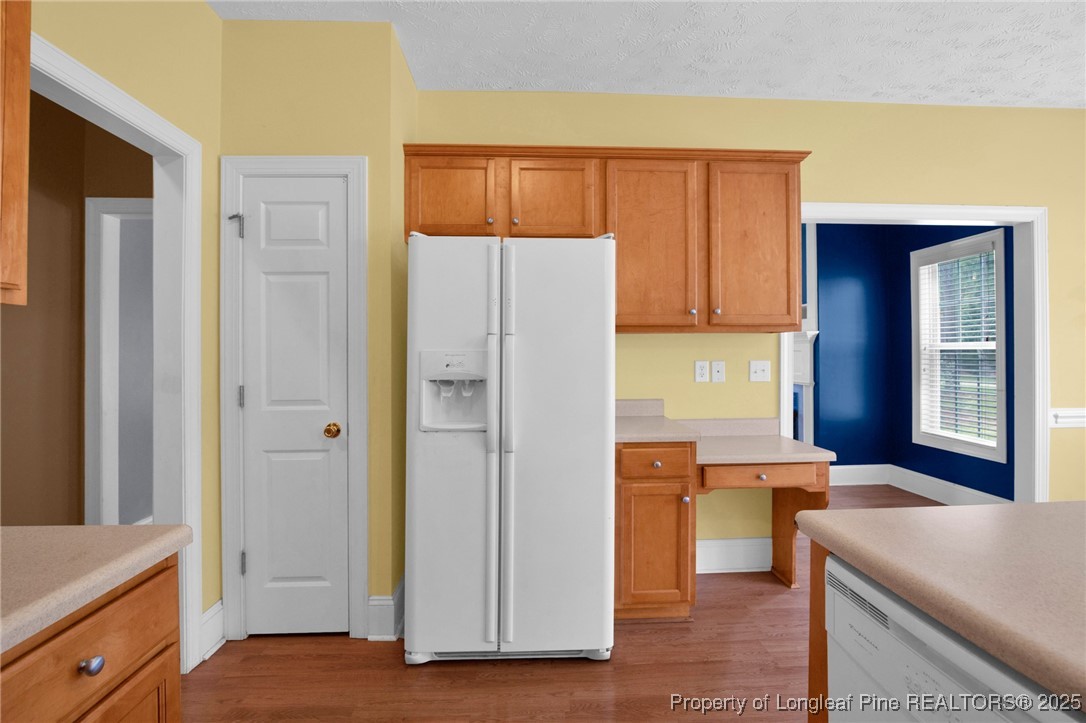 121 Shell Drive Elizabethtown, NC 28337 - Photo 12 of 36 a kitchen with stainless steel appliances granite countertop a refrigerator and a stove
