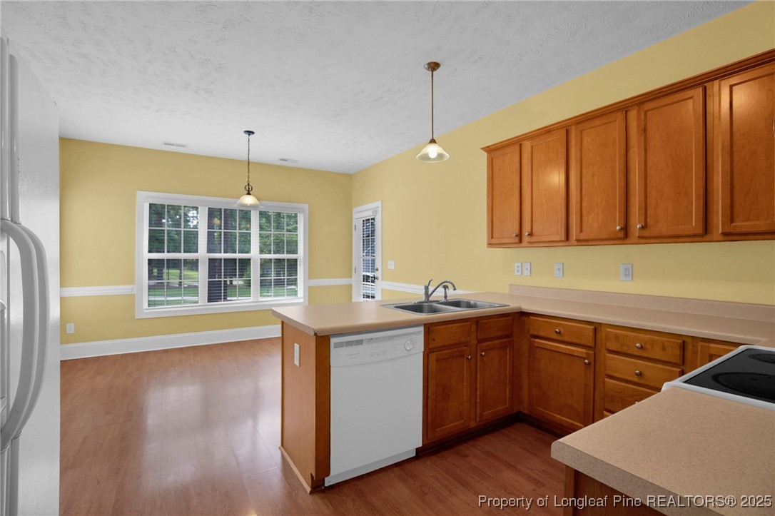 121 Shell Drive Elizabethtown, NC 28337 - Photo 14 of 36 a kitchen with a sink window and cabinets