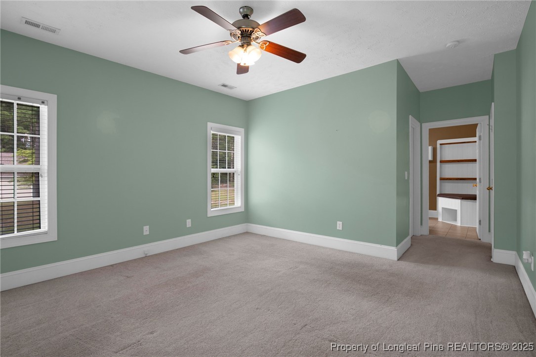 121 Shell Drive Elizabethtown, NC 28337 - Photo 20 of 36 a view of an empty room with a window