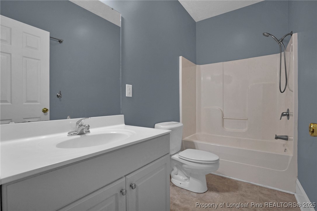121 Shell Drive Elizabethtown, NC 28337 - Photo 28 of 36 a bathroom with a sink toilet and shower