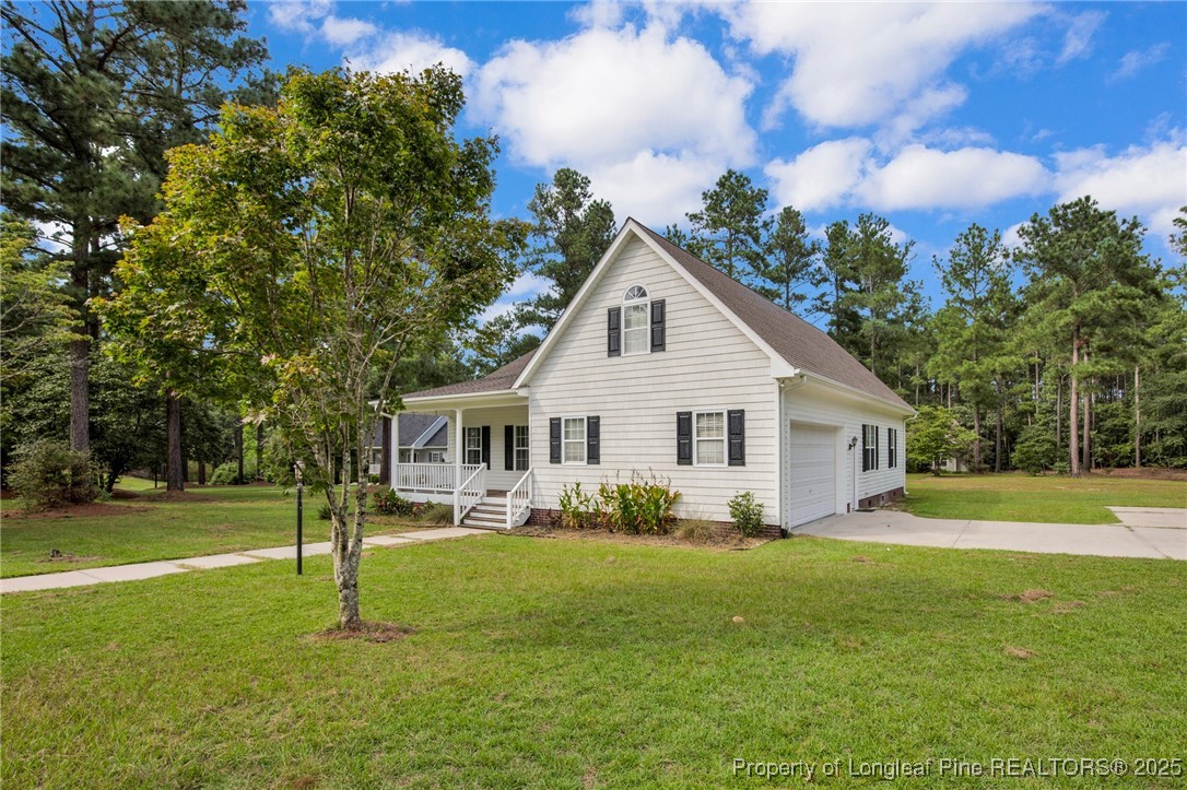121 Shell Drive Elizabethtown, NC 28337 - Photo 3 of 36 a view of a house with a big yard