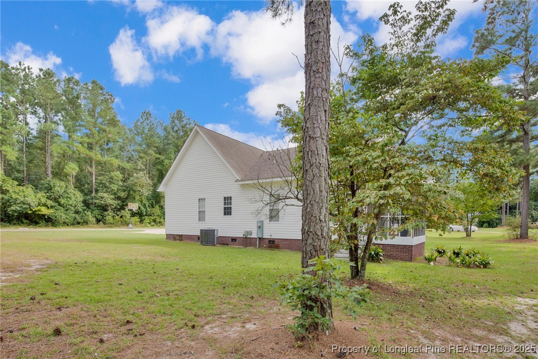 121 Shell Drive Elizabethtown, NC 28337 - Photo 33 of 36 a view of a house with a yard