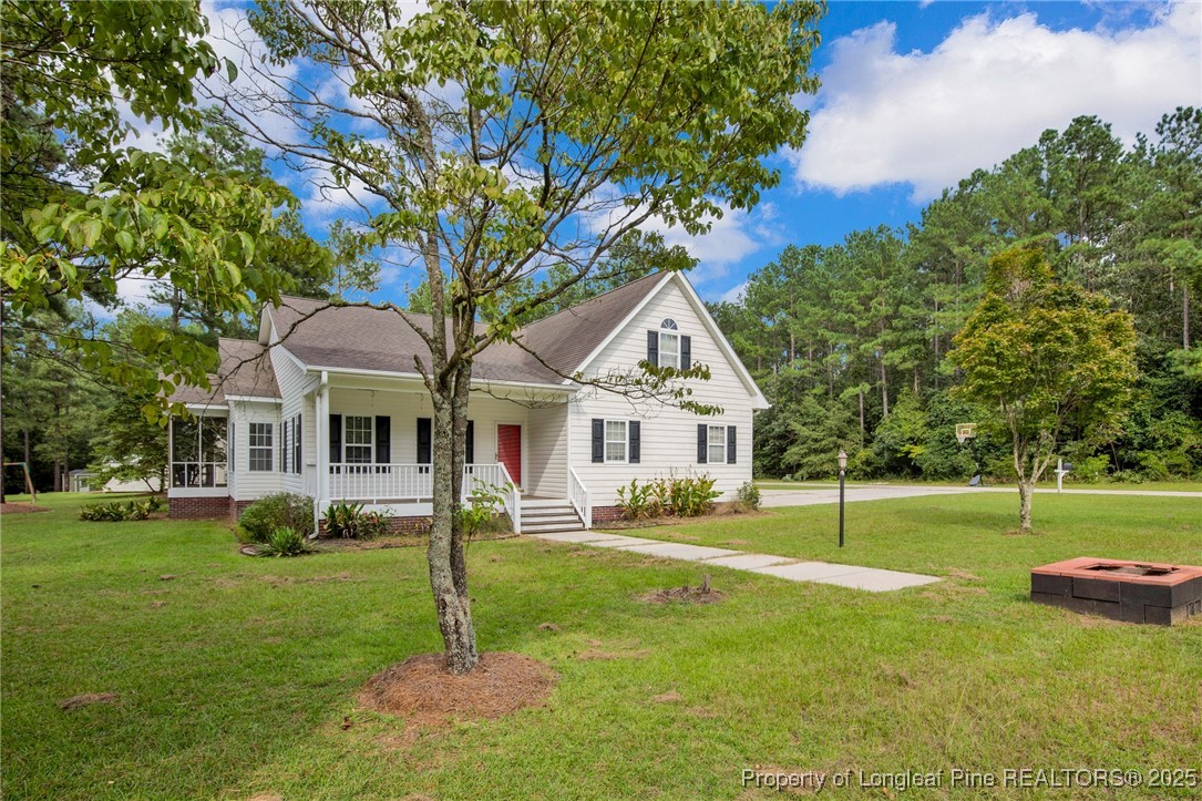 121 Shell Drive Elizabethtown, NC 28337 - Photo 4 of 36 a front view of a house with a yard