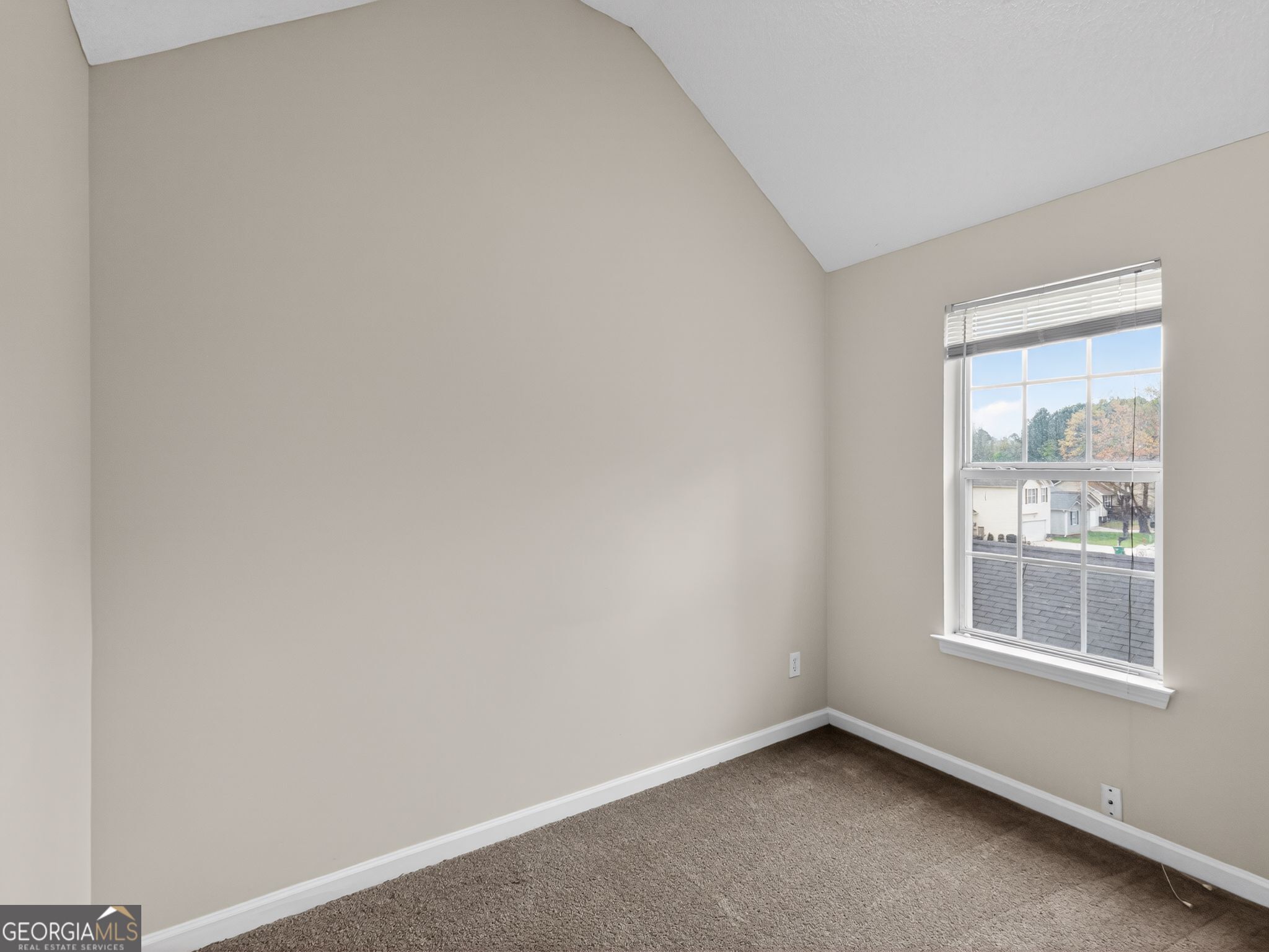4460 Abram Way Conley, GA 30288 - Photo 14 of 29 an empty room with windows