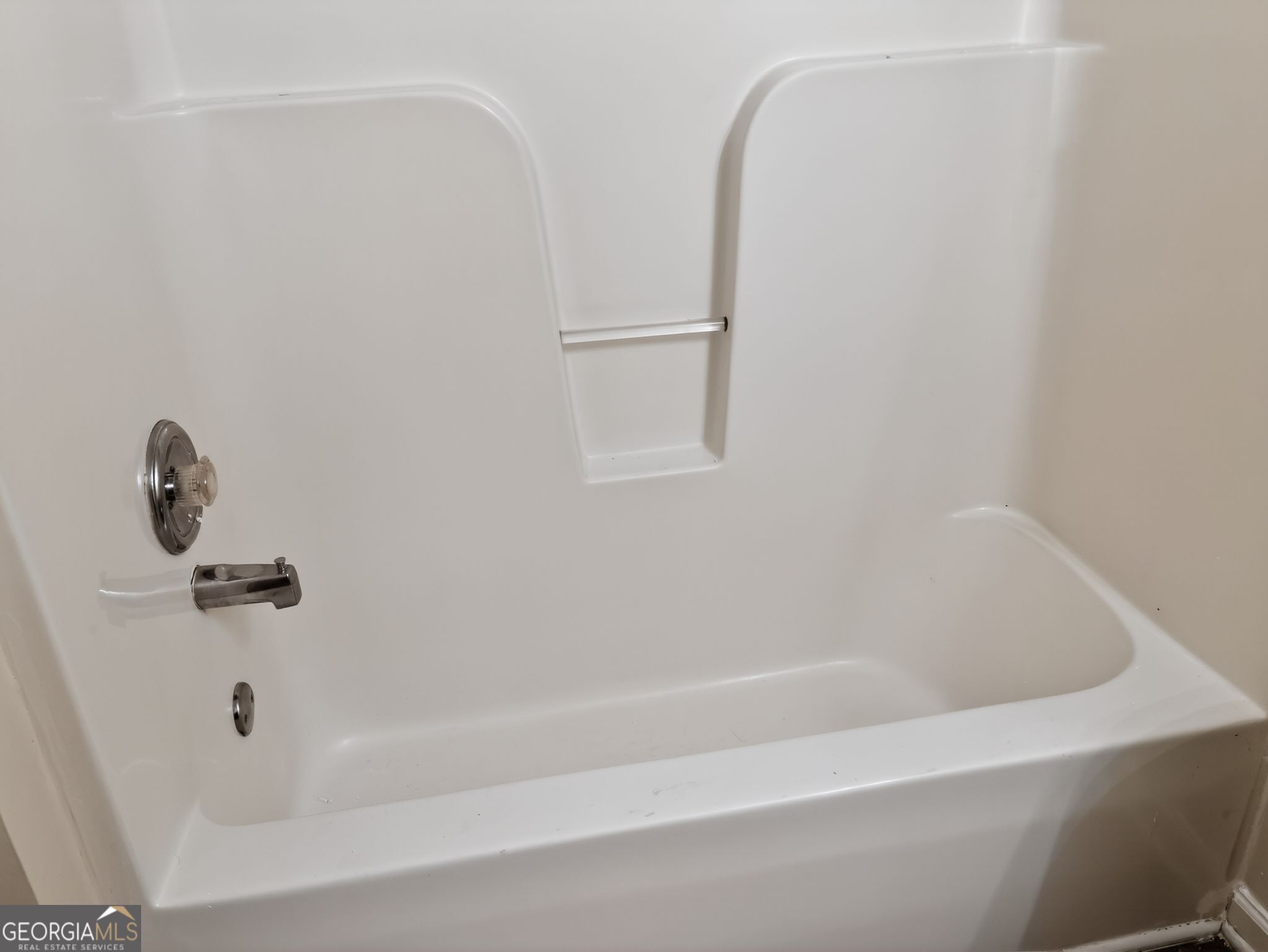 4460 Abram Way Conley, GA 30288 - Photo 20 of 29 a close up of a bathtub in a bathroom