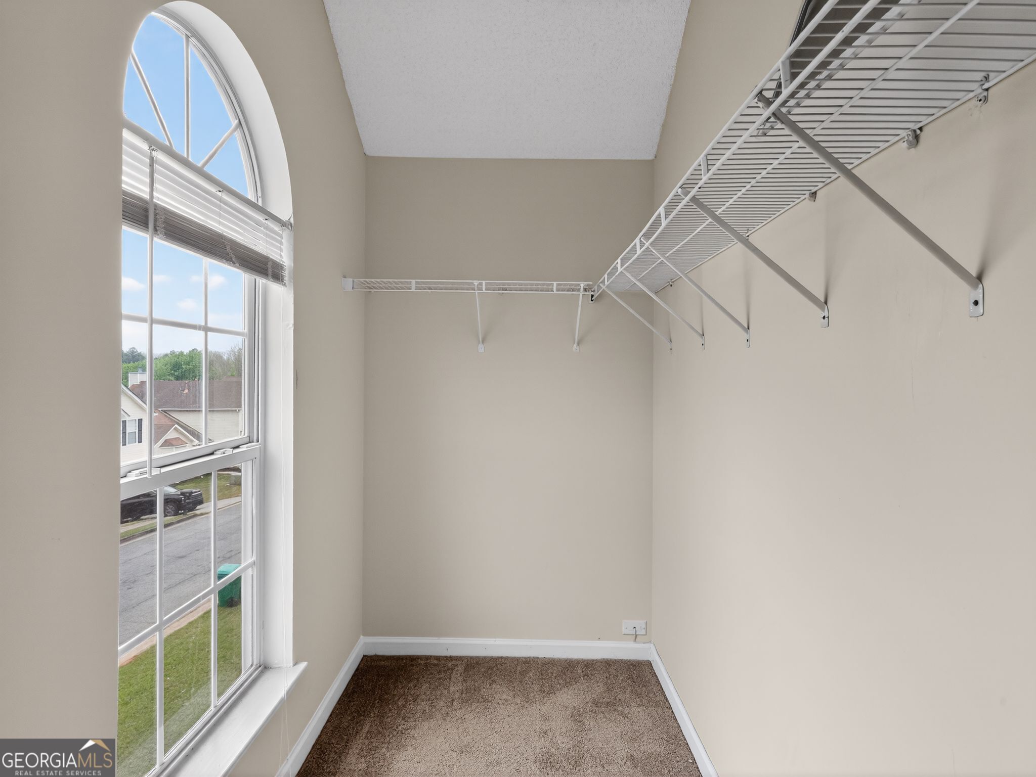 4460 Abram Way Conley, GA 30288 - Photo 23 of 29 a view of a room with rack on the wall