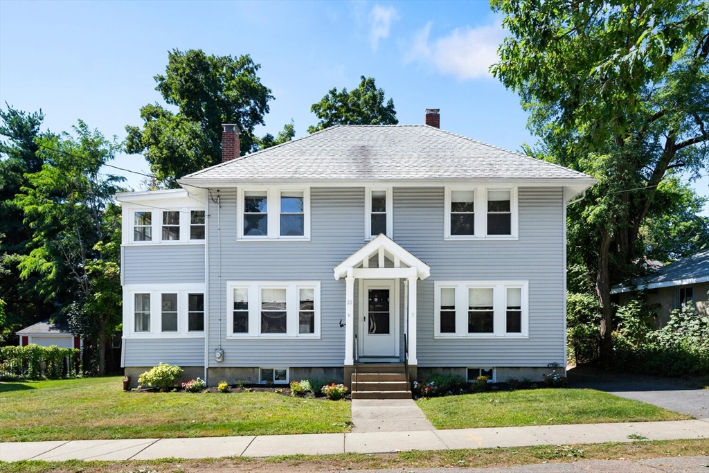 20 Marion Road Watertown, MA 02472 - Photo 1 of 33 a front view of a house with a yard