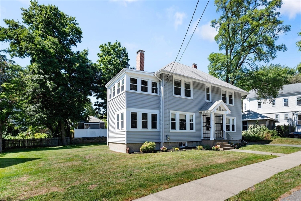 20 Marion Road Watertown, MA 02472 - Photo 29 of 33 a front view of a house with a yard