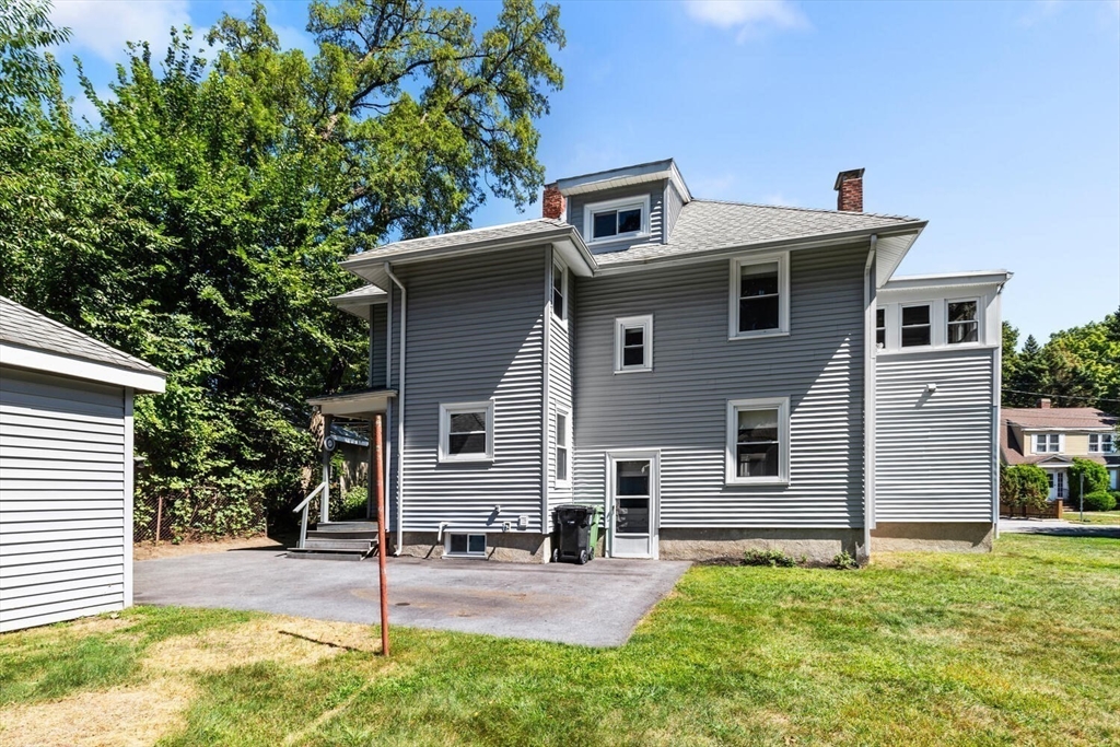 20 Marion Road Watertown, MA 02472 - Photo 30 of 33 a front view of a house with garden