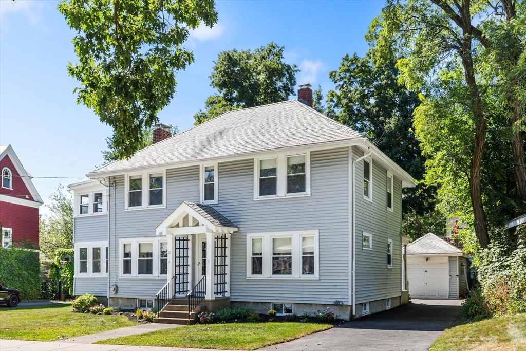 20 Marion Road Watertown, MA 02472 - Photo 3 of 33 a front view of a house with a yard