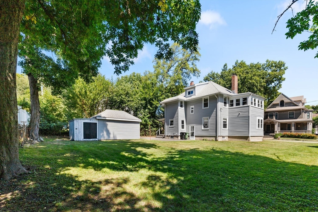 20 Marion Road Watertown, MA 02472 - Photo 4 of 33 a front view of house with yard and green space