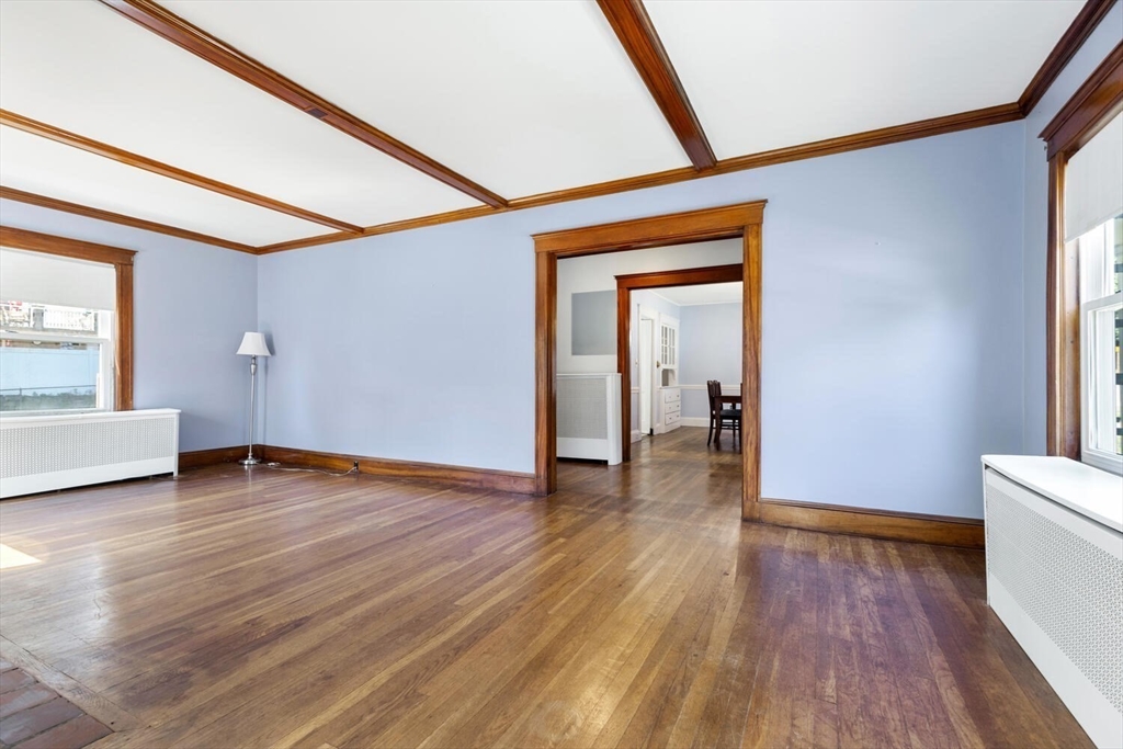 20 Marion Road Watertown, MA 02472 - Photo 9 of 33 a view of empty room with wooden floor and fan