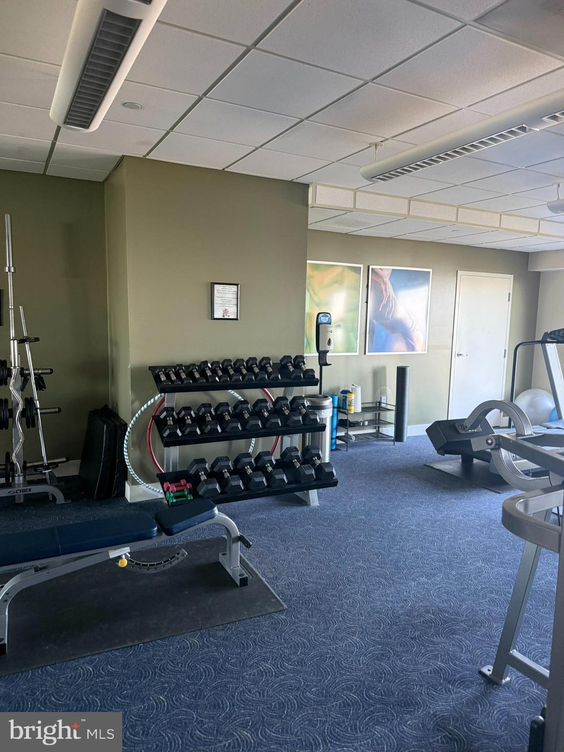 8501 Bayside Road, Unit 702 Chesapeake Beach, MD 20732 - Photo 8 of 11 a room with furniture and a wooden floor