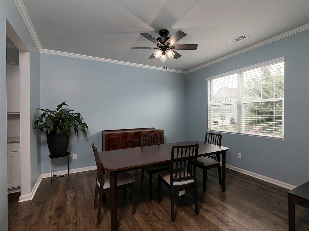 371 Highgrove Circle Dallas, GA 30157 - Photo 8 of 20 a dining room with furniture and window