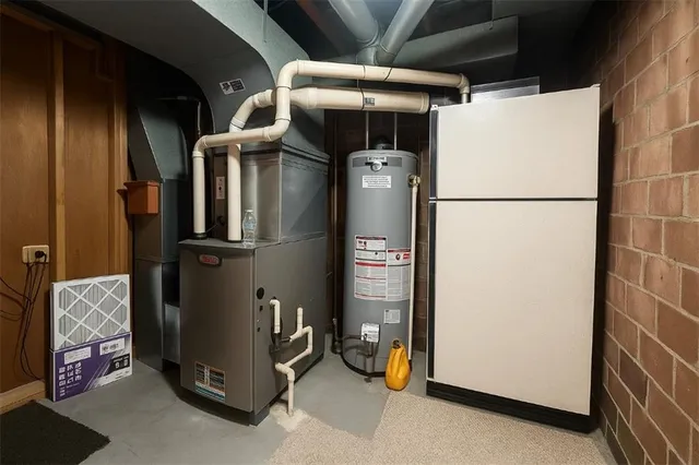 a view of storage and utility room with washer and dryer