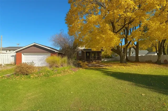 a view of swimming pool with a yard