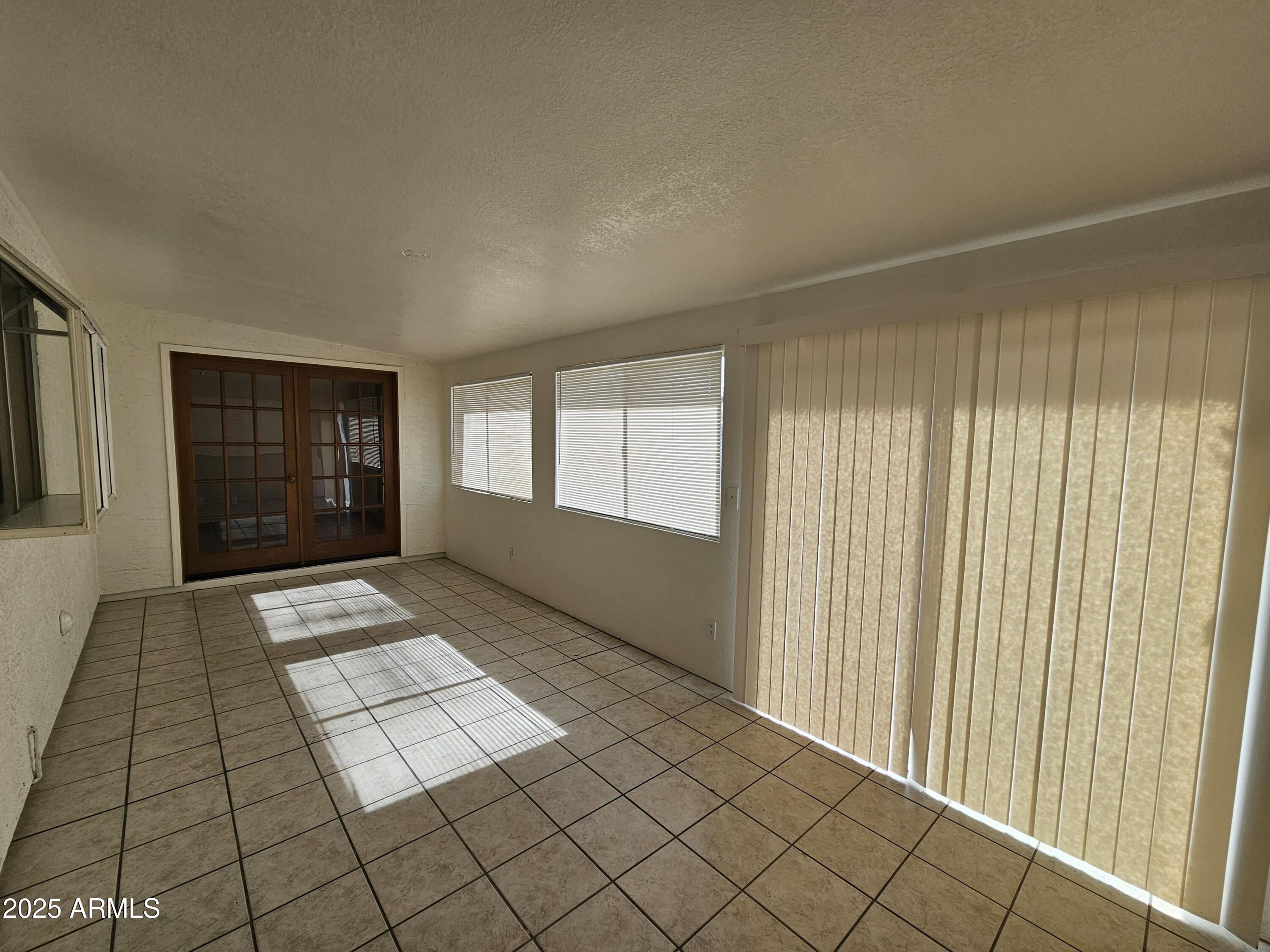 5523 West Yucca Street Glendale, AZ 85304 - Photo 10 of 18 a view of an empty room and window