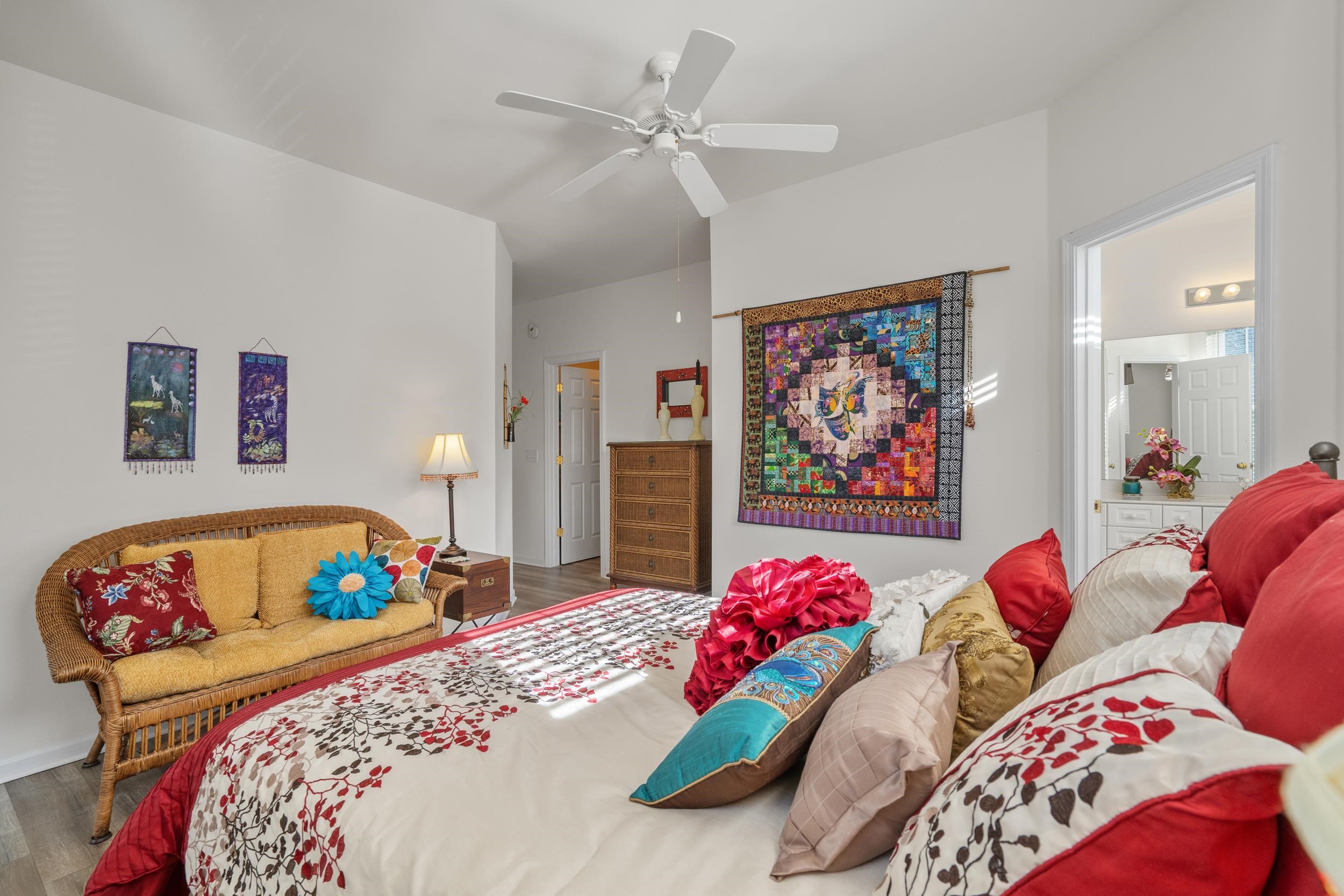 4436 Lady Banks Lane, Unit D2 Murrells Inlet, SC 29576 - Photo 11 of 32 Bedroom with wood finished floors and a ceiling fan
