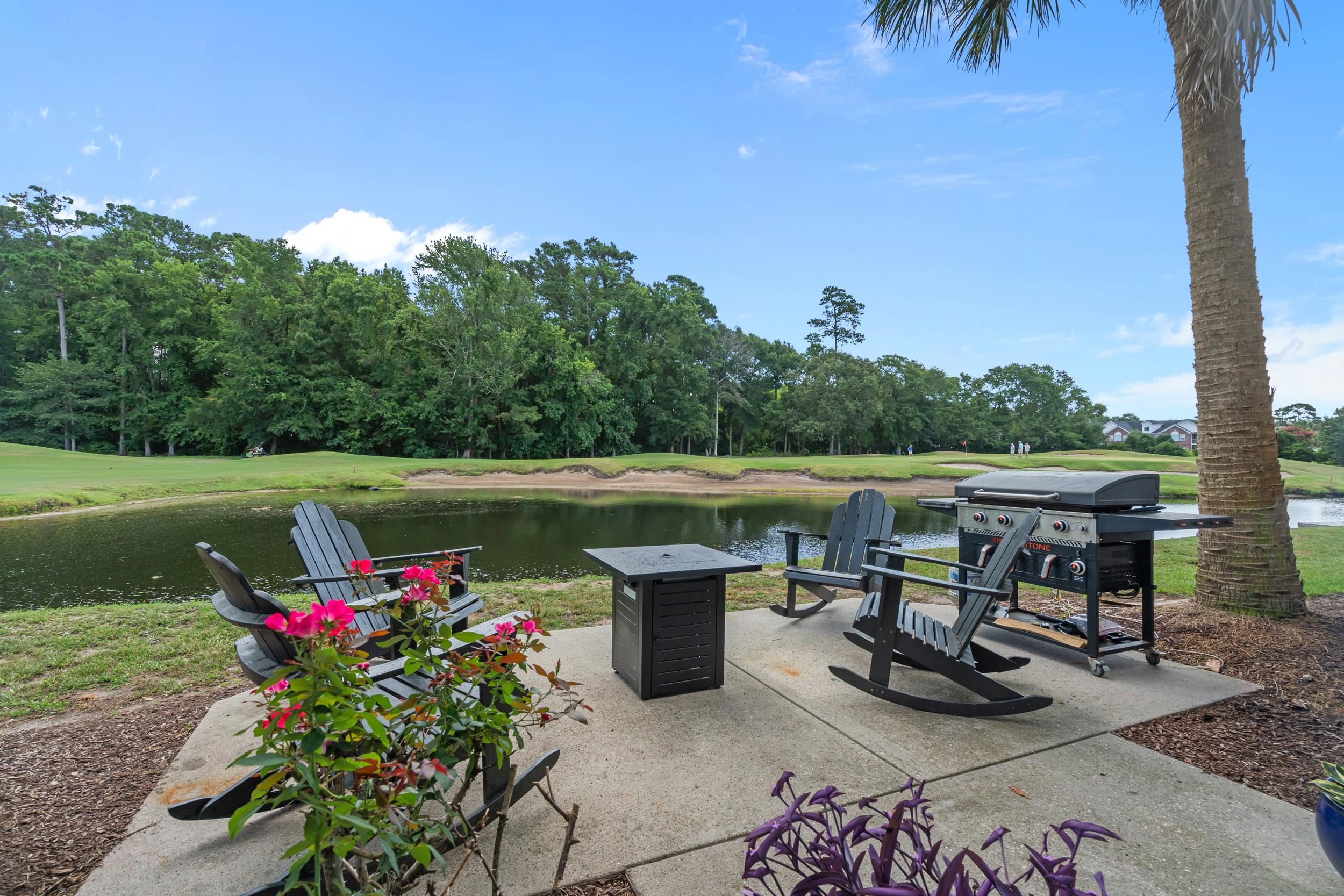 4436 Lady Banks Lane, Unit D2 Murrells Inlet, SC 29576 - Photo 25 of 32 View of patio featuring grilling area and a water view
