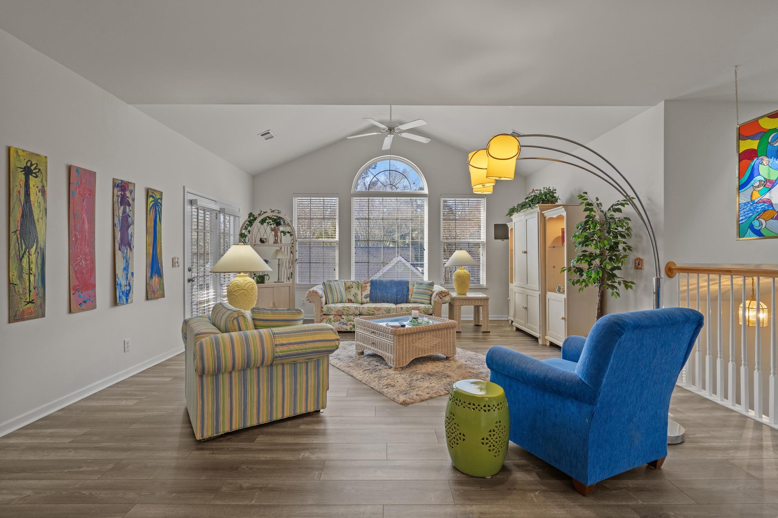 4436 Lady Banks Lane, Unit D2 Murrells Inlet, SC 29576 - Photo 3 of 32 Living room featuring vaulted ceiling, a ceiling fan, and wood finished floors